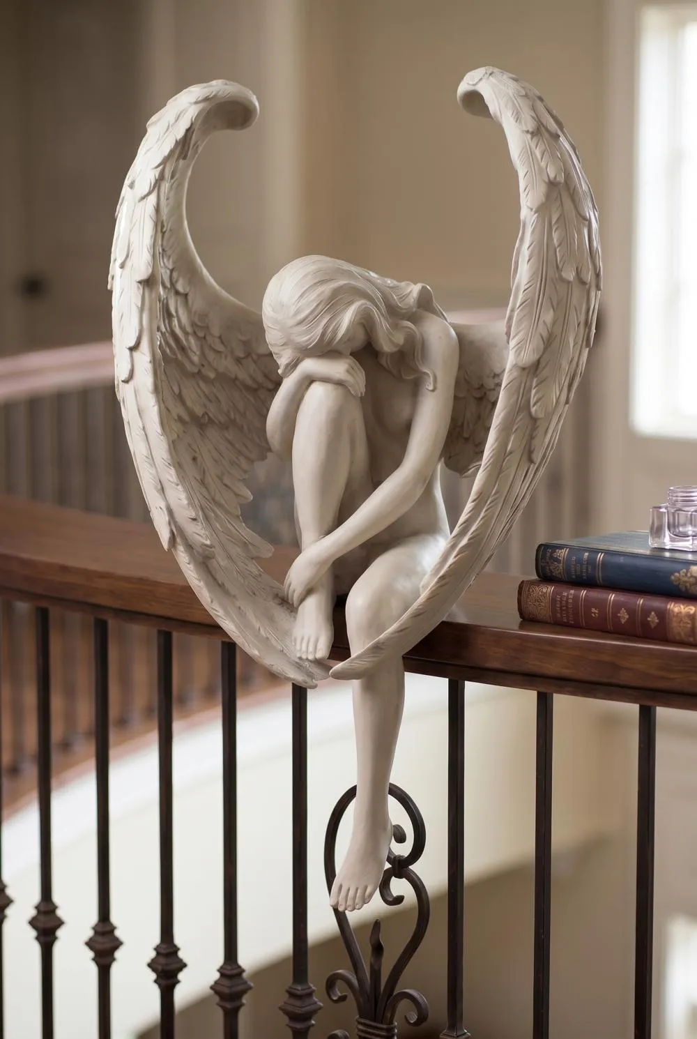 The Anguished Angel Long-Winged Sitting Statue